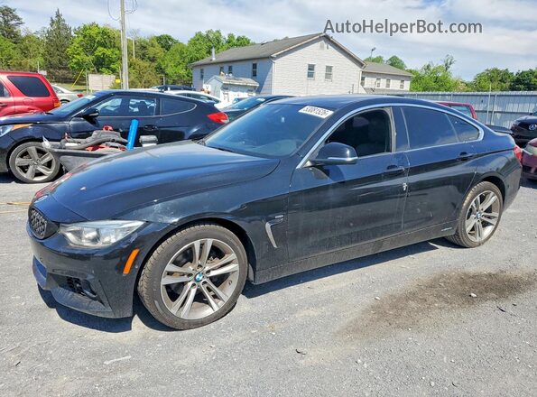 WBA4C9C57GG137052 2016 BMW OTHER Black Vista tres cuartos delantera izquierda