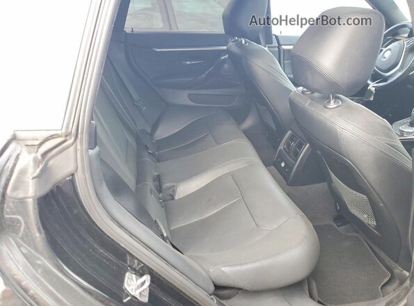 WBA4C9C57GG137052 2016 BMW OTHER Black Vista de los asientos traseros