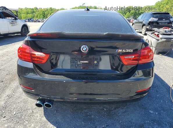WBA4C9C57GG137052 2016 BMW OTHER Black Vista trasera