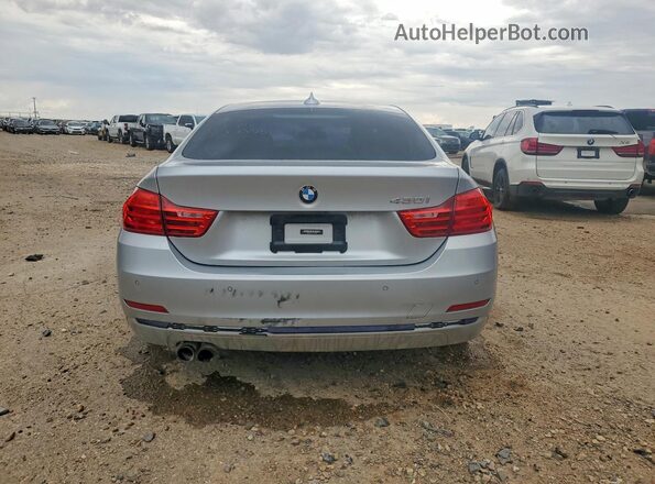 WBA4F7C57HG787240 2017 BMW OTHER Серебряный Вид сзади
