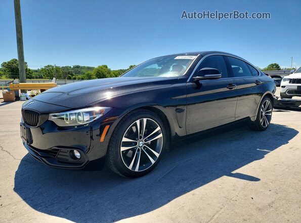 WBA4J1C09LCD55140 2020 BMW OTHER Black წინა მარცხენა ხედი სამი მეოთხედიდან