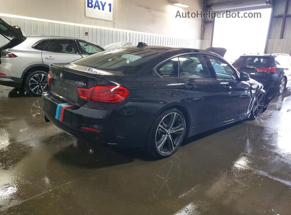 WBA4J3C50JBL03211 2018 BMW OTHER Black Trasero derecho