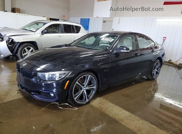 WBA4J3C50JBL03211 2018 BMW OTHER Black Vista tres cuartos delantera izquierda
