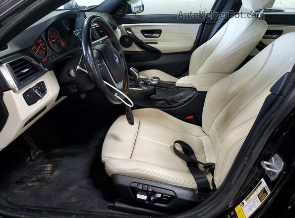 WBA4J3C50JBL03211 2018 BMW OTHER Black Vista interior delantera