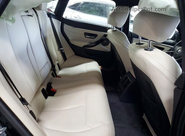 WBA4J3C50JBL03211 2018 BMW OTHER Black Vista de los asientos traseros
