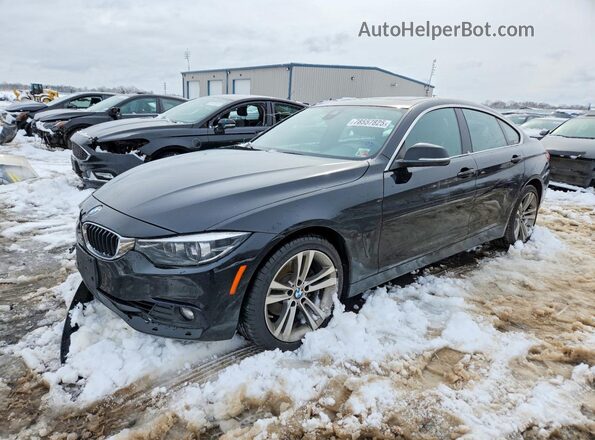 WBA4J3C55KBL08874 2019 BMW OTHER Charcoal Vista tres cuartos delantera izquierda