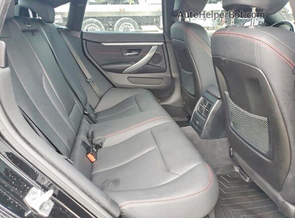 WBA4J3C5XJBL03166 2018 BMW OTHER Черный Вид задних сидений