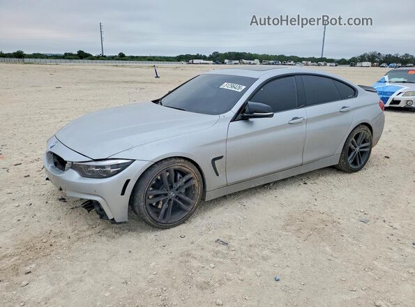 WBA4J5C53JBF07502 2018 BMW OTHER Серебряный Передняя левая четверть