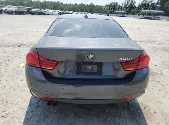 WBA4W3C59JAC97581 2018 BMW OTHER Gray Vista trasera
