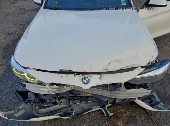 WBA4W7C55JAB87666 2018 BMW OTHER White Vista interior trasera