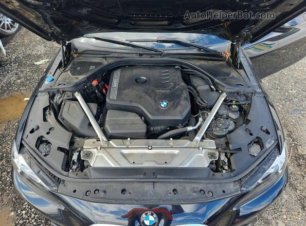 WBA53AP01MCG24998 2021 BMW OTHER Black Vista interior trasera