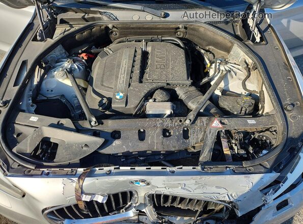 WBA5M2C52GGH99469 2016 BMW 5 SERIES Серебряный Вид задней части салона