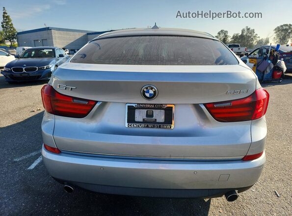 WBA5M2C52GGH99469 2016 BMW 5 SERIES Серебряный Вид сзади