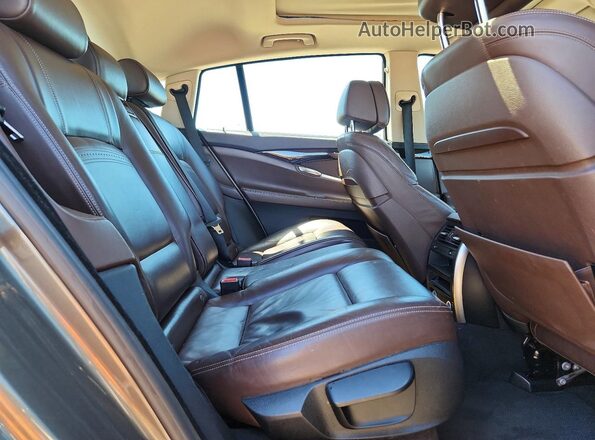 WBA5M4C57GD186581 2016 BMW OTHER Gray Вид задньої частини салону