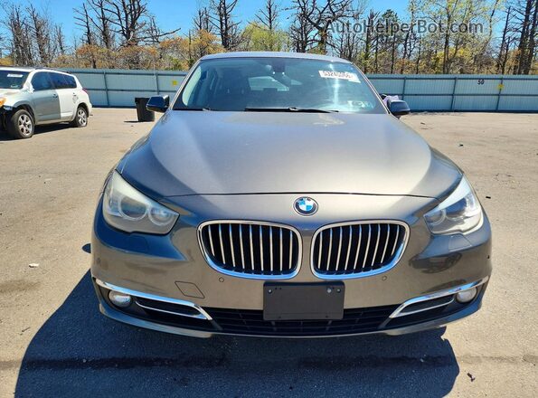 WBA5M4C57GD186581 2016 BMW OTHER Gray Вид спереду