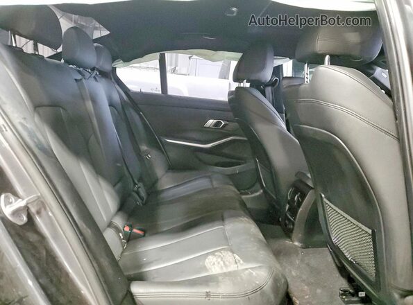 WBA5R7C07LFH50612 2020 BMW OTHER Charcoal Vista de los asientos traseros