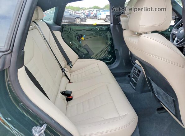 WBA63AV09PFP29425 2023 BMW OTHER Green Vista de los asientos traseros