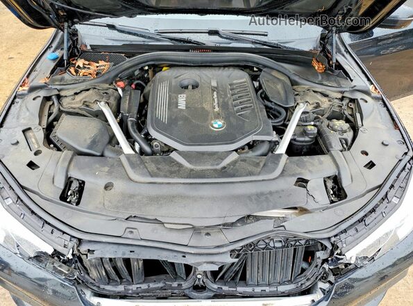 WBA7E2C50KB218298 2019 BMW OTHER Черный Вид задней части салона