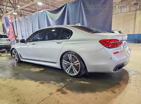 WBA7E2C56KB217513 2019 BMW OTHER Серебряный Задняя левая четверть