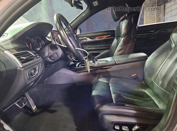 WBA7E2C56KB217513 2019 BMW OTHER Серебряный Вид салона спереди