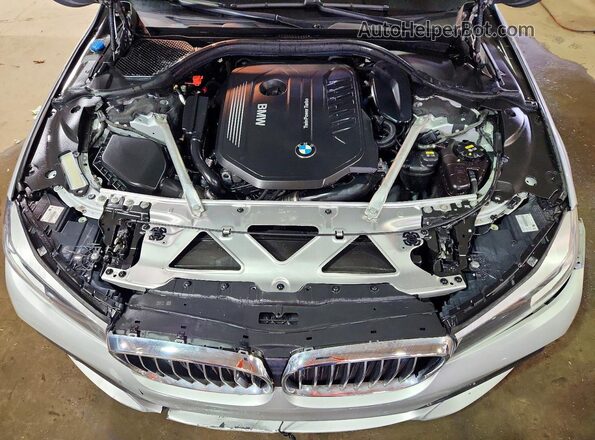 WBA7E2C56KB217513 2019 BMW OTHER Серебряный Вид задней части салона