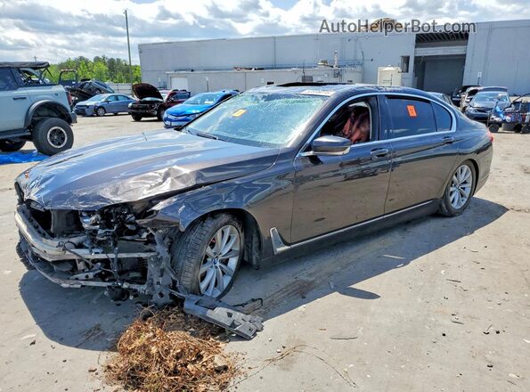 WBA7E4C51HGU99082 2017 BMW OTHER Черный Передняя левая четверть