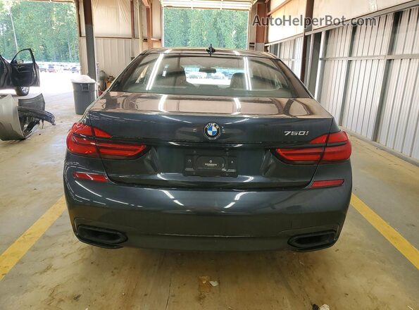 WBA7F0C52KGM25151 2019 BMW OTHER Синий Вид сзади