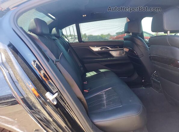 WBA7F2C58JB238164 2018 BMW OTHER Black Vista de los asientos traseros