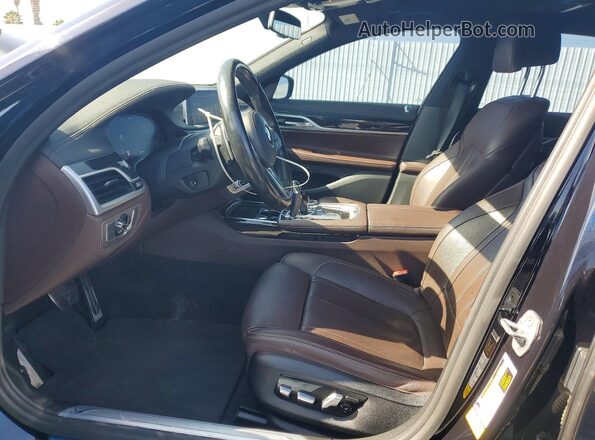 WBA7T2C05MCE98648 2021 BMW OTHER Черный Вид салона спереди