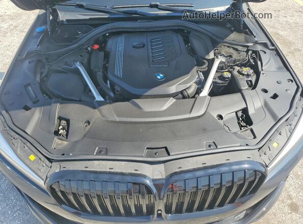 WBA7T4C0XLGF97081 2020 BMW OTHER Черный Вид задней части салона
