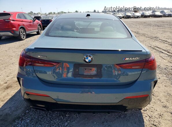 WBA83DA01SCT76298 2025 BMW M4 Teal Вид ззаду