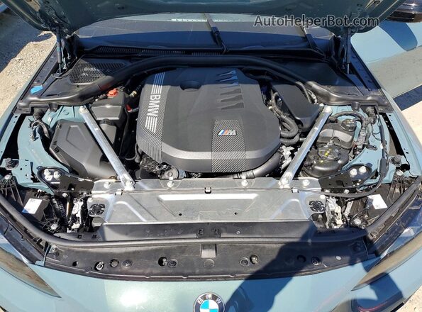 WBA83DA01SCT76298 2025 BMW M4 Teal Вид задньої частини салону