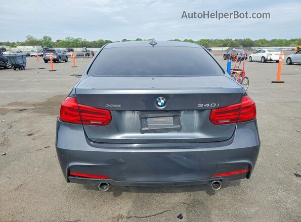 WBA8B7G52HNU37467 2017 BMW OTHER Gray Vista trasera