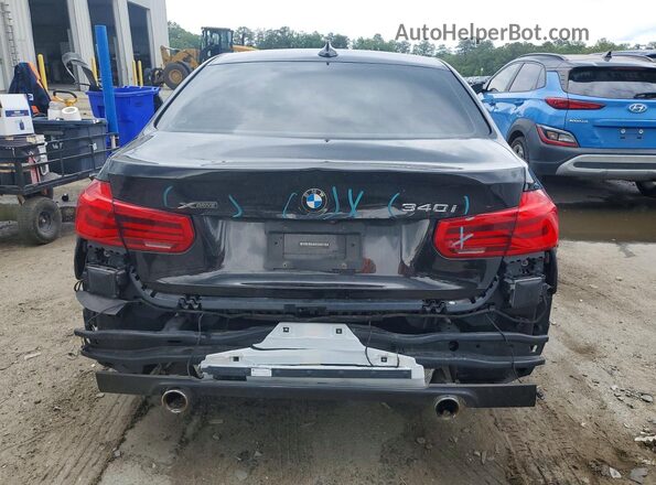 WBA8B7G57JNU95113 2018 BMW OTHER Black Вид ззаду