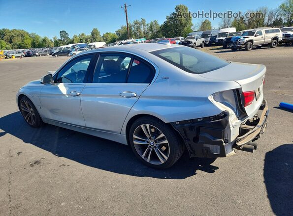 WBA8E1C3XHA156324 2017 BMW OTHER Silver Trasero izquierdo