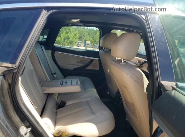 WBA8Z5C53GG500424 2016 BMW OTHER Black უკანა სავარძლების ხედი
