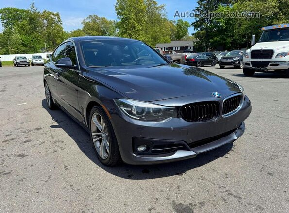 WBA8Z9C51JB220190 2018 BMW OTHER Black Вид спереду