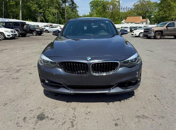 WBA8Z9C51JB220190 2018 BMW OTHER Black Вид салону спереду
