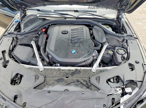 WBADZ2C06PCK62058 2023 BMW OTHER Black Սալոնի հետևի տեսք