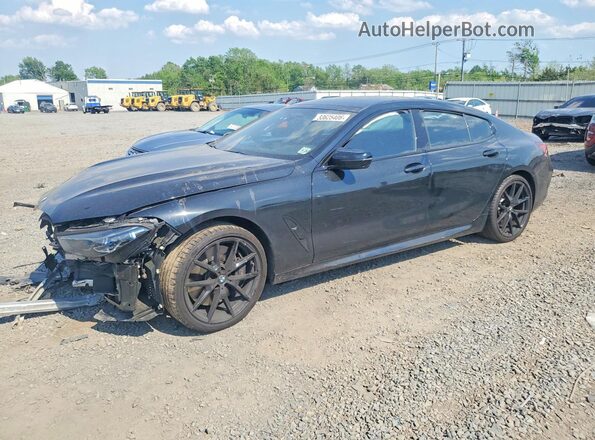 WBAGV8C07RCR10036 2024 BMW M8 Black Vista tres cuartos delantera izquierda
