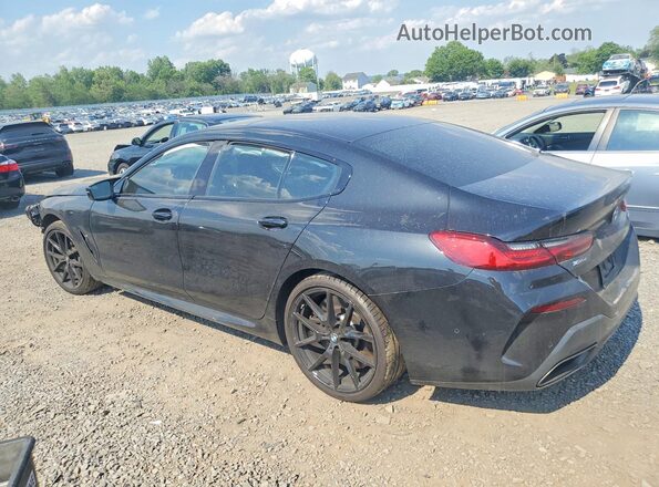 WBAGV8C07RCR10036 2024 BMW M8 Black Trasero izquierdo