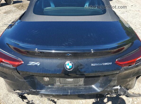 WBAHF3C02PWY16467 2023 BMW Z4 Gray Vista de los asientos traseros