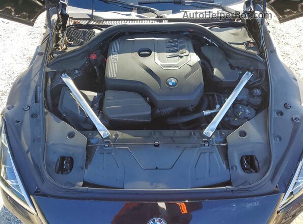 WBAHF3C02PWY16467 2023 BMW Z4 Gray Vista interior trasera