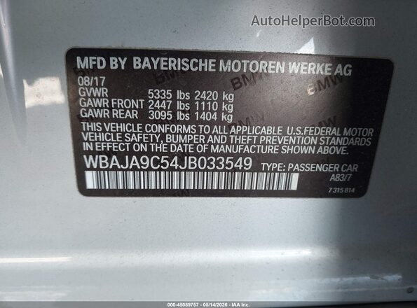 WBAJA9C54JB033549 2018 BMW OTHER Silver Vista del compartimento del motor