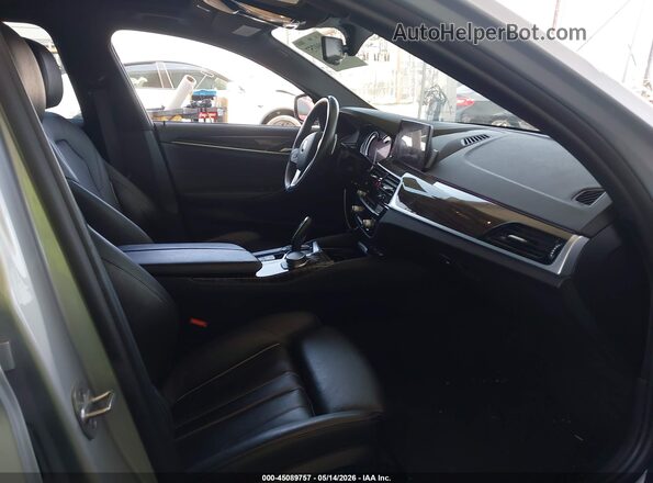 WBAJA9C54JB033549 2018 BMW OTHER Silver Vista interior delantera