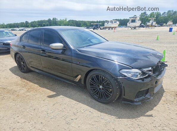 WBAJB9C50JG464583 2018 BMW M5 Black Front right