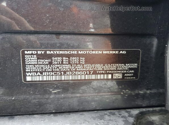 WBAJB9C51JB286017 2018 BMW M5 Charcoal Vista del compartimento del motor