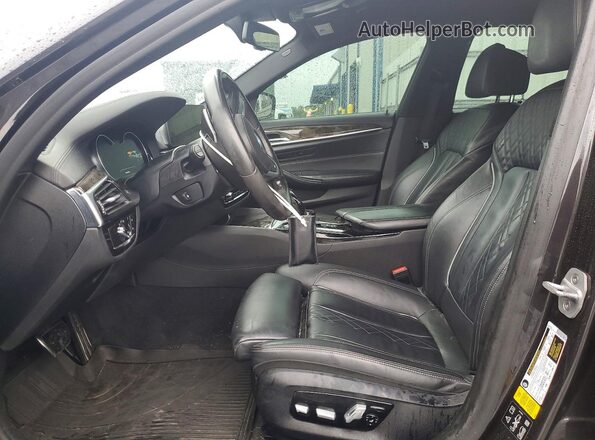 WBAJB9C51JB286017 2018 BMW M5 Charcoal Vista interior delantera