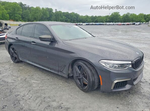 WBAJB9C51JB286017 2018 BMW M5 Charcoal Delantero derecho