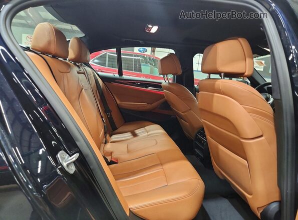 WBAJB9C52JB035796 2018 BMW OTHER Blue უკანა სავარძლების ხედი